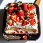 Tres Leches Cake with Whipped Cream and Strawberries